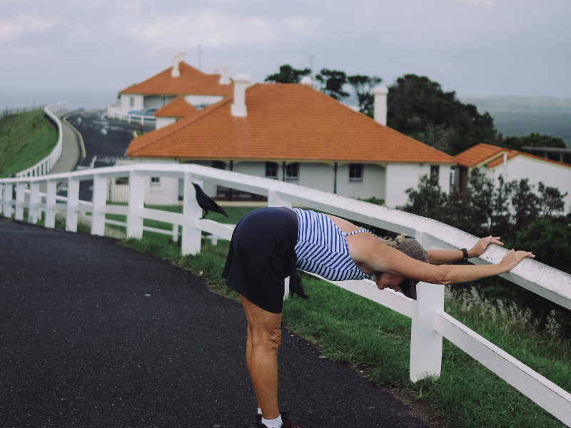 Person stretching in the morning as part of best morning exercises