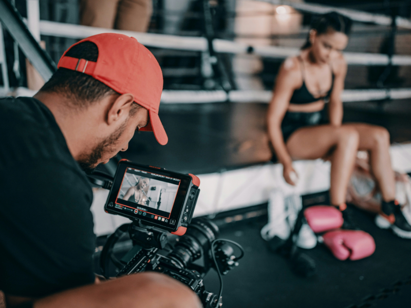 Two friends supporting each other during a workout