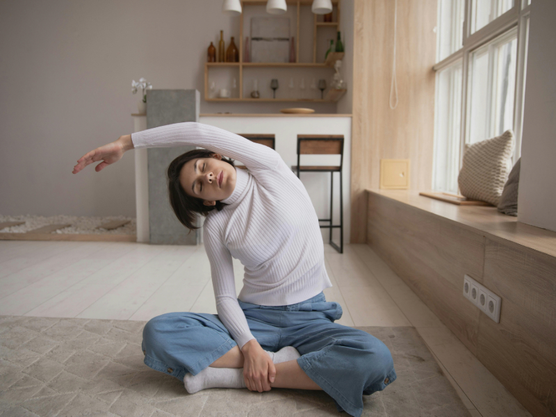 Beginner starting to work out when out of shape by doing light stretching at home