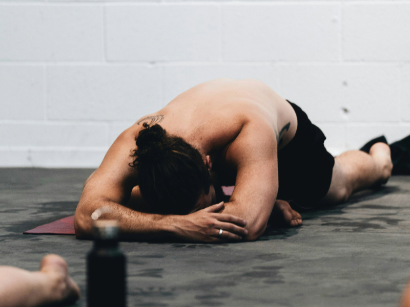 Beginner feeling exhausted from overtraining during workout