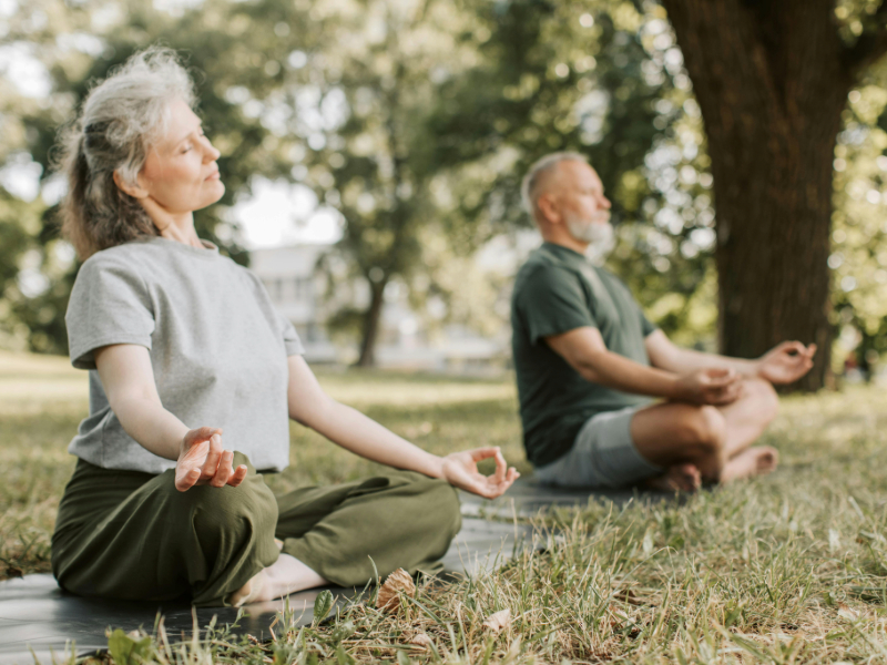 Fitness for beginners over 50 practicing yoga for balance and mobility